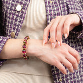 Elegant gold-plated bracelet featuring 10mm Watermelon Tourmaline beads.